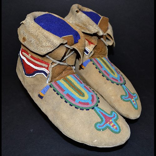 Early Blackfoot moccasins with cut beads, circa: 1875